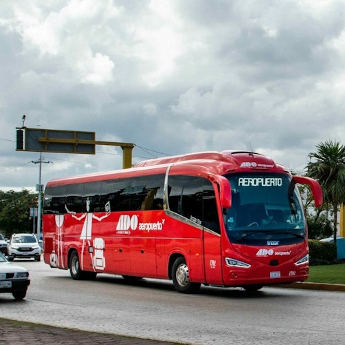 Cancún: Traslado en autobús desde/hasta el aeropuerto y el centro de Cancún