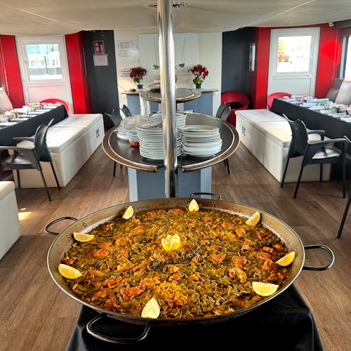 Valencia: Paseo en barco con paella valenciana