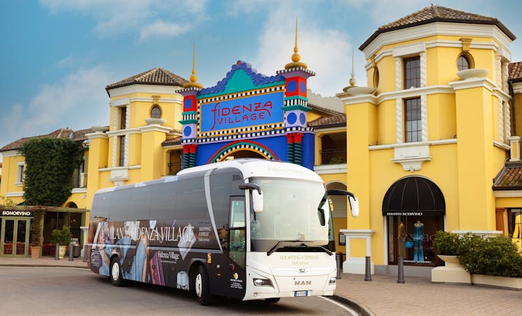 Full-day luxury shopping experience at Fidenza Village with lunch